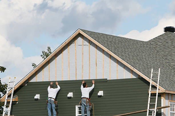 Professional Siding Installation technician working in Morganville, NJ